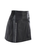 FALDA RIÑONERA CON BOLSILLOS Y RIBETE TEJIDO